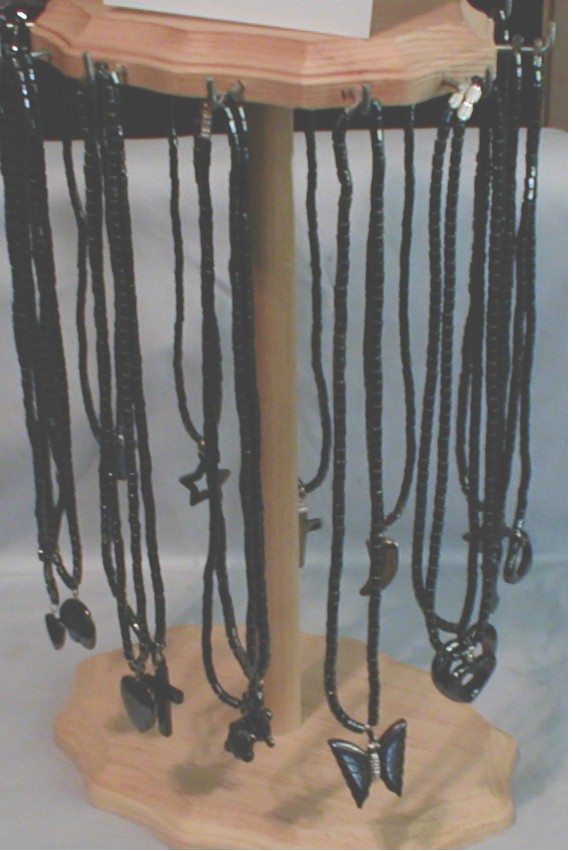 Display With Hematite Pendant Necklaces